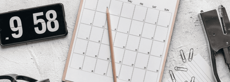 image of a Calendar, clock, and stapler